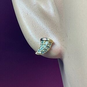 Gold tone stud earrings with clear stones